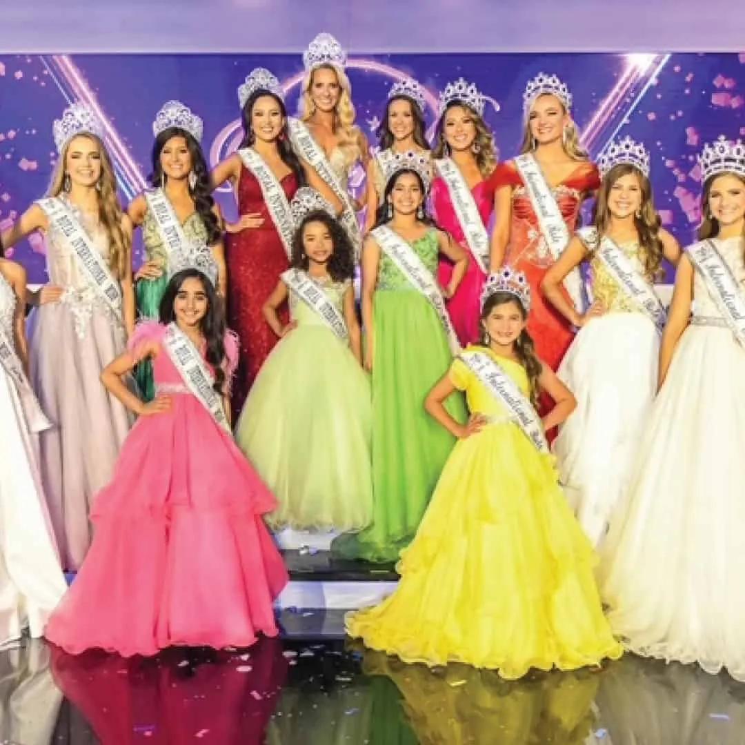 Crowned Queens of every age together on the Royal International Miss stage