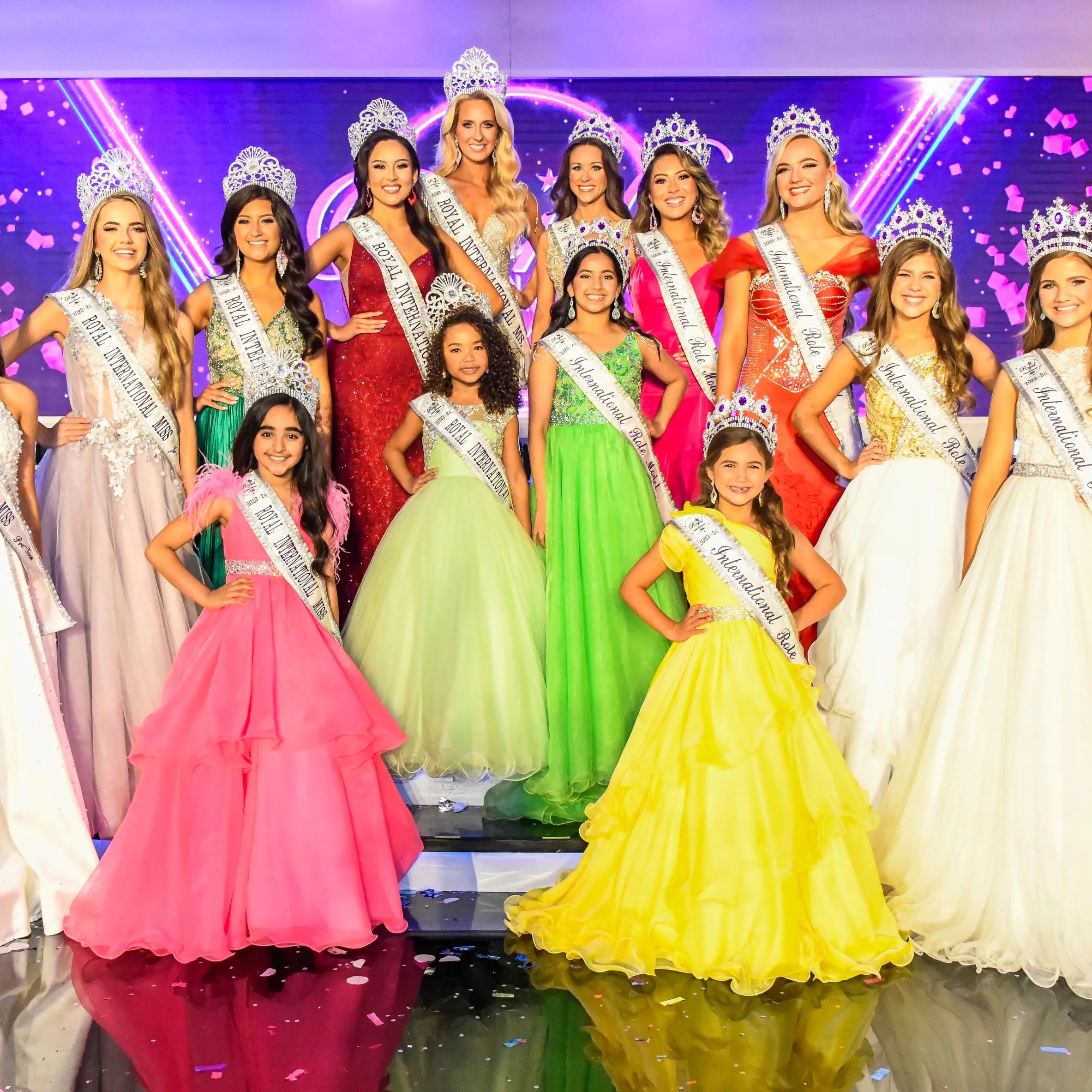 Crowned Queens of every age together on the Royal International Miss stage